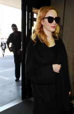 CHRISTINA HENDRICKS Arrives at Los Angeles International Airport