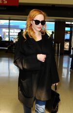 CHRISTINA HENDRICKS Arrives at Los Angeles International Airport