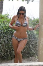 CLAUDIA ROMANI in Bikini Taking a Shower in Miami