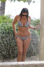CLAUDIA ROMANI in Bikini Taking a Shower in Miami