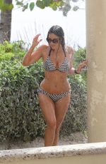 CLAUDIA ROMANI in Bikini Taking a Shower in Miami