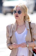 DAKOTA FANNING in Over-the-knee Boots Out in New York