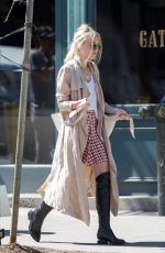 DAKOTA FANNING in Over-the-knee Boots Out in New York