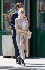 DAKOTA FANNING in Over-the-knee Boots Out in New York