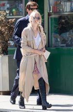 DAKOTA FANNING in Over-the-knee Boots Out in New York