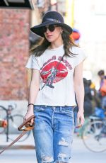 DAKOTA JOHNSON in Ripped Jeans Walks Her Dog in New York