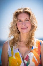 ELIZABETH MITCHELL at Crossing Lines Photocall in Cannes