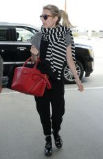 EMMA ROBERTS Arrives at LAX Airport in Los Angeles