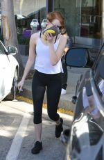 EMMA STONE in Tights Out and About in West Hollywood