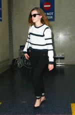 EMMA WATSON Arrives at LAX Airport in Los Angeles 04/22/2015