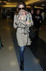 EMMY ROSSUM Arrives at Los Angeles International Airport