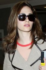 EMMY ROSSUM Arrives at Los Angeles International Airport