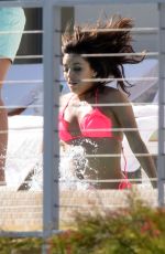 EVA LONGORIA in Bikini on the Pool in Miami
