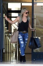 HILARY DUFF Leaves Barneys New York in Beverly Hills 04/29/2015
