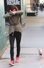 JULIETTE LEWIS Walks Her Dog Out in New York 04/28/2015