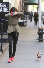 JULIETTE LEWIS Walks Her Dog Out in New York 04/28/2015