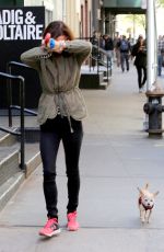 JULIETTE LEWIS Walks Her Dog Out in New York 04/28/2015