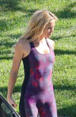 KATE HUDSON in Purple Uni-tard at a Park in Los Angeles