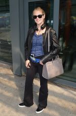 KATE UPTON Arrives at Heathrow Airport 04/25/2015