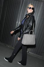 KATE UPTON Arrives at Heathrow Airport 04/25/2015