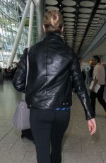 KATE UPTON Arrives at Heathrow Airport 04/25/2015