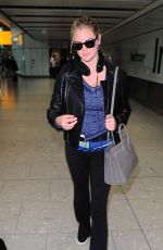 KATE UPTON Arrives at Heathrow Airport 04/25/2015