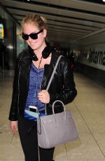 KATE UPTON Arrives at Heathrow Airport 04/25/2015