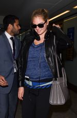 KATE UPTON Arrives at Heathrow Airport 04/25/2015