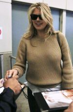 KATE UPTON at Vancouver International Airport 04/28/2015