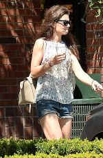 KATIE HOLMES in Jeans Shorts Leaves Starbucks in Beverly Hills