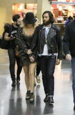 KESHA Arrives at Airport in New York