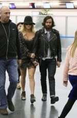 KESHA Arrives at Airport in New York