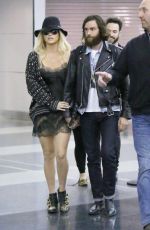 KESHA Arrives at Airport in New York