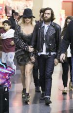 KESHA Arrives at Airport in New York