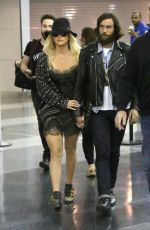 KESHA Arrives at Airport in New York