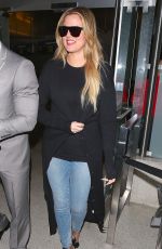 KHLOE KARDASHIAN in Jeans at LAX Airport in Los Angeles