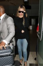 KHLOE KARDASHIAN in Jeans at LAX Airport in Los Angeles