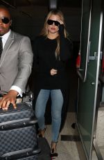 KHLOE KARDASHIAN in Jeans at LAX Airport in Los Angeles