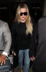 KHLOE KARDASHIAN in Jeans at LAX Airport in Los Angeles
