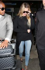 KHLOE KARDASHIAN in Jeans at LAX Airport in Los Angeles