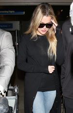 KHLOE KARDASHIAN in Jeans at LAX Airport in Los Angeles