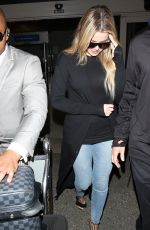KHLOE KARDASHIAN in Jeans at LAX Airport in Los Angeles