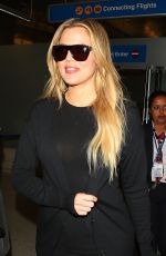 KHLOE KARDASHIAN in Jeans at LAX Airport in Los Angeles