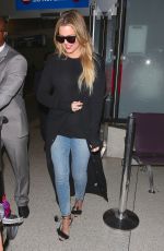 KHLOE KARDASHIAN in Jeans at LAX Airport in Los Angeles