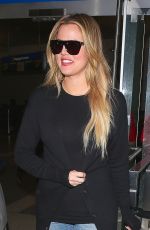KHLOE KARDASHIAN in Jeans at LAX Airport in Los Angeles