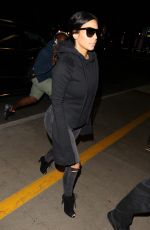 KIM KARDASHIAN Arrives at LAX Airport in Los Angeles 04/20/2015