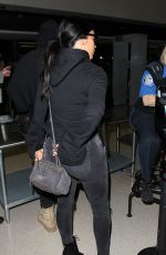 KIM KARDASHIAN Arrives at LAX Airport in Los Angeles 04/20/2015