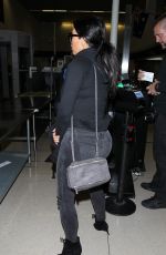 KIM KARDASHIAN Arrives at LAX Airport in Los Angeles 04/20/2015