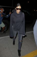 KIM KARDASHIAN Arrives at LAX Airport in Los Angeles 04/20/2015