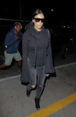 KIM KARDASHIAN Arrives at LAX Airport in Los Angeles 04/20/2015